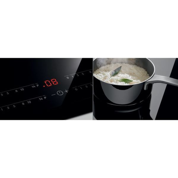 Индукционная варочная панель Electrolux EIT61443B &ndash; фото